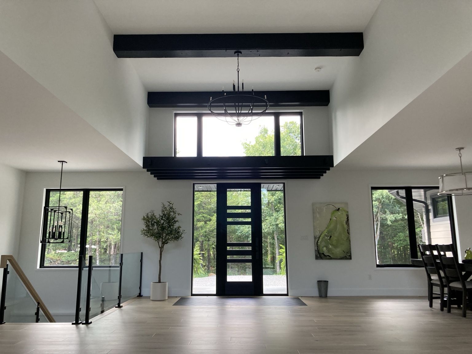 Custom black architectural beams and millwork in a modern home